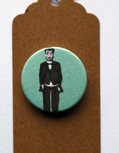 tall man badge for web